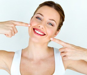 Patient in Washington pointing out their cosmetic dentistry